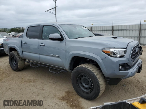 2018 Toyota Tacoma SR with VIN 3TMCZ5AN0JM187541, listed as a Copart auction lot 54212155 with 69,197 mi miles and Salvage Title. Bid and sale history available at carsss.com. Image 4.