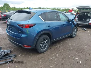 2017 Mazda CX-5 Touring z VIN JM3KFBCL9H0224962, wystawiony jako IAAI lot #42312104 z przebiegiem Nie podano mil oraz . Historia ofert i sprzedaży dostępna na DreamBid. Obrazek 4.