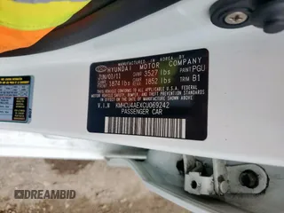 2012 Hyundai Accent GLS with VIN KMHCU4AEXCU069242, listed as a Copart auction lot 61475315 with 136,591 mi miles and Salvage title. Bid and sale history available at DreamBid. Image 12.