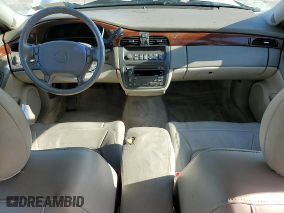 2004 Cadillac DeVille z VIN 1G6KD57Y14U149606, wystawiony jako Copart lot #51230955 z przebiegiem Nie podano mil oraz Szkoda całkowita • Salvage title. Historia ofert i sprzedaży dostępna na DreamBid. Obrazek 8.