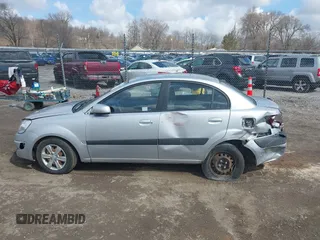 2009 Kia Rio LX with VIN KNADE223796521410, listed as a IAAI auction lot 41887883 with 82,360 mi miles and . Bid and sale history available at DreamBid. Image 13.