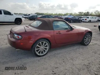 2007 Mazda MX-5 Miata Sport z VIN JM1NC25F270127574, wystawiony jako Copart lot #51538215 z przebiegiem 131 339 mil mil oraz Szkoda całkowita • Salvage title. Historia ofert i sprzedaży dostępna na DreamBid. Obrazek 3.