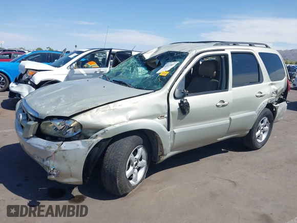 2005 Mazda Tribute i with VIN 4F2YZ02Z75KM56108, listed as a IAAI auction lot 42022864 with Not Provided miles and . Bid and sale history available at carsss.com. Image 2.