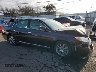 2012 Toyota Avalon with VIN 4T1BK3DBXCU471081, listed as a Copart auction lot 47921305 with 194,502 mi miles and Salvage Title. Bid and sale history available at carsss.com. Image 4.