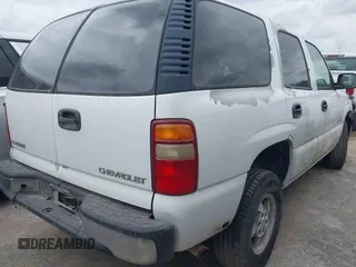 2003 Chevrolet Tahoe LS with VIN 1GNEC13V83R261152, listed as a IAAI auction lot 42546536 with 50,695 mi miles and . Bid and sale history available at DreamBid. Image 4.