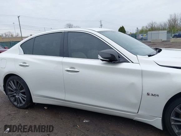 2020 Infiniti Q50 Red Sport 400 with VIN JN1FV7AR0LM660315, listed as a IAAI auction lot 41951851 with 102,475 mi miles and . Bid and sale history available at carsss.com. Image 13.