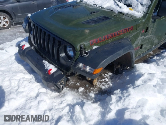 2023 Jeep Gladiator Rubicon with VIN 1C6JJTBG6PL576818, listed as a IAAI auction lot 41515428 with 10,271 mi miles and . Bid and sale history available at DreamBid. Image 6.