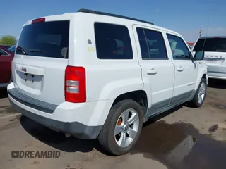 2011 Jeep Patriot Latitude with VIN 1J4NT1GB5BD245263, listed as a IAAI auction lot 41942376 with 215,147 mi miles. Bid and sale history available at carsss.com. Image 4.