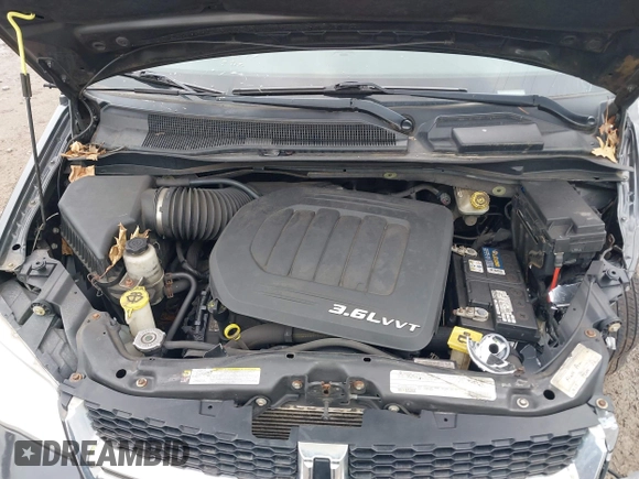 2012 Dodge Grand Caravan SXT with VIN 2C4RDGCG8CR242235, listed as a IAAI auction lot 41922083 with 124,306 mi miles and . Bid and sale history available at DreamBid. Image 10.
