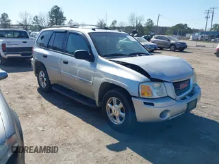 2005 GMC Envoy SLT with VIN 1GKDT13S952219826, listed as a IAAI auction lot 41783713 with 212,908 mi miles. Bid and sale history available at carsss.com. Image 1.