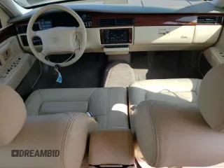1995 Cadillac Concours z VIN 1G6KF52Y1SU245573, wystawiony jako Copart lot #68715984 z przebiegiem Nie podano mil oraz Szkody całkowita. Historia ofert i sprzedaży dostępna na DreamBid. Obrazek 8.