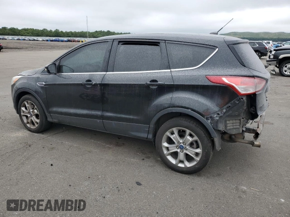 2013 Ford Escape SEL with VIN 1FMCU9H92DUA86916, listed as a Copart auction lot 63516415 with 167,791 mi miles and Salvage title. Bid and sale history available at DreamBid. Image 2.