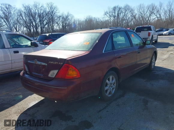 2002 Toyota Avalon XL with VIN 4T1BF28B82U216940, listed as a IAAI auction lot 41841874 with 298,982 mi miles and . Bid and sale history available at DreamBid. Image 4.