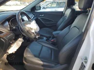 2017 Hyundai Santa Fe 2.0T z VIN 5XYZUDLA3HG397569, wystawiony jako Copart lot #77360944 z przebiegiem 145 512 mil mil oraz Szkoda całkowita • Salvage title. Historia ofert i sprzedaży dostępna na DreamBid. Obrazek 7.