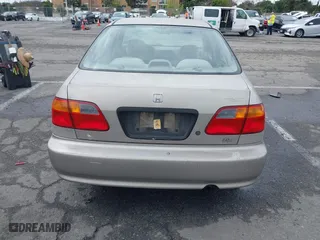 2000 Honda Civic DX with VIN 1HGEJ6625YL058339, listed as a IAAI auction lot 41521835 with 120,282 mi miles. Bid and sale history available at carsss.com. Image 16.