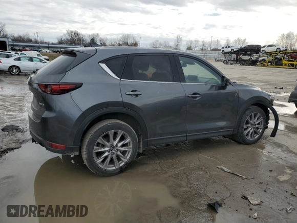 2021 Mazda CX-5 Grand Touring with VIN JM3KFBDM9M0452011, listed as a Copart auction lot 46230945 with 54,825 mi miles and Salvage Title. Bid and sale history available at carsss.com. Image 3.