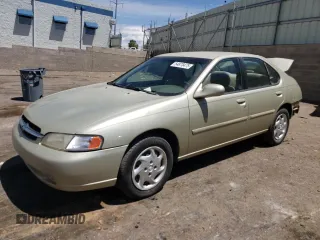 1999 Nissan Altima XE z VIN 1N4DL01D6XC153989, wystawiony jako Copart lot #54878475 z przebiegiem 308 863 mil mil oraz Szkoda całkowita • Salvage title. Historia ofert i sprzedaży dostępna na DreamBid. Obrazek 1.