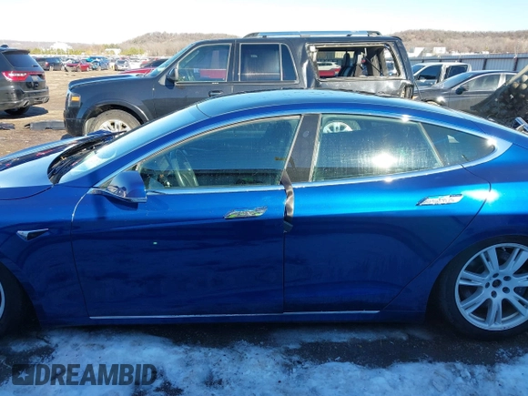 2020 Tesla Model S Long Range with VIN 5YJSA1E26LF410779, listed as a IAAI auction lot 41241192 with 68,764 mi miles and . Bid and sale history available at DreamBid. Image 15.
