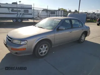 1998 Nissan Maxima GXE с VIN JN1CA21DXWT516867, выставлен на аукционе Copart как лот 50271275 с пробегом 183 021 миль миль и Списание • Salvage title. История ставок и продаж доступна на DreamBid. Изображение 1.