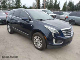 2017 Cadillac XT5 FWD with VIN 1GYKNARS2HZ188557, listed as a IAAI auction lot 41840764 with 104,524 mi miles. Bid and sale history available at carsss.com. Image 1.