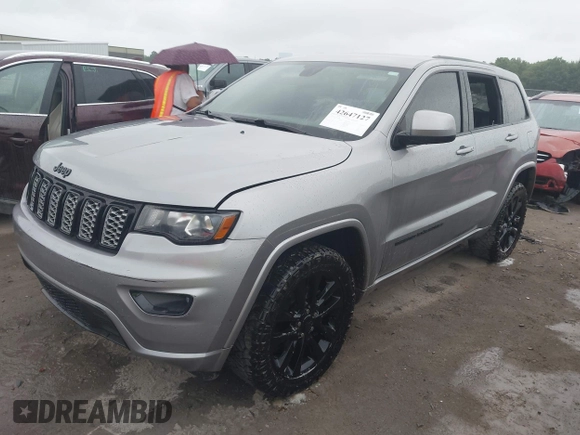 2018 Jeep Grand Cherokee Laredo E with VIN 1C4RJFAG6JC452859, listed as a IAAI auction lot 42647127 with 107,869 mi miles and . Bid and sale history available at DreamBid. Image 16.