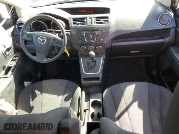 2012 Mazda 5 Sport with VIN JM1CW2BL4C0107068, listed as a Copart auction lot 62880615 with 142,610 mi miles and Salvage title. Bid and sale history available at DreamBid. Image 8.