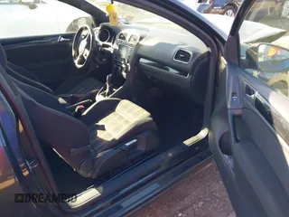 2012 Volkswagen GTI w/Conv & Sunroof with VIN WVWEV7AJ6CW161963, listed as a IAAI auction lot 41398810 with 172,582 mi miles and . Bid and sale history available at DreamBid. Image 5.