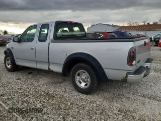 2002 Ford F-150 XL with VIN 1FTRX17232NB46169, listed as a Copart auction lot 49477685 with 182,508 mi miles and Salvage Title. Bid and sale history available at carsss.com. Image 2.