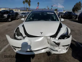 2019 Tesla Model 3 Mid Range z VIN 5YJ3E1EA7KF300175, wystawiony jako Copart lot #49651815 z przebiegiem Nie podano mil oraz Szkoda całkowita • Salvage title. Historia ofert i sprzedaży dostępna na DreamBid. Obrazek 5.