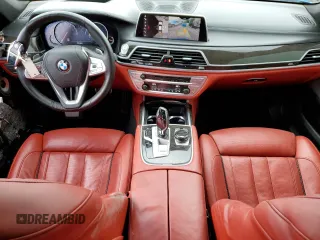 2019 BMW 7 Series 750i z VIN WBA7F0C51KGM25707, wystawiony jako Copart lot #61950495 z przebiegiem 56 768 mil mil oraz Nie do naprawy • Non repairable. Historia ofert i sprzedaży dostępna na DreamBid. Obrazek 8.