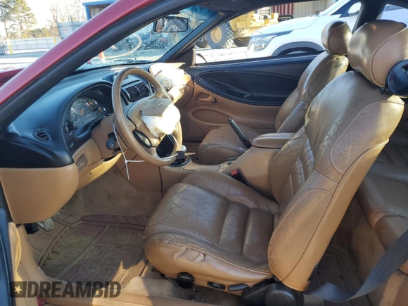 1996 Ford Mustang GT z VIN 1FALP42X0TF168223, wystawiony jako Copart lot #46351085 z przebiegiem 121 657 mil mil oraz Szkoda całkowita • Salvage title. Historia ofert i sprzedaży dostępna na DreamBid. Obrazek 7.