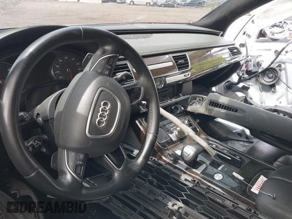 2015 Audi A8 4.0T z VIN WAU32AFD2FN038880, wystawiony jako IAAI lot #42138932 z przebiegiem 102 968 mil mil oraz . Historia ofert i sprzedaży dostępna na DreamBid. Obrazek 5.