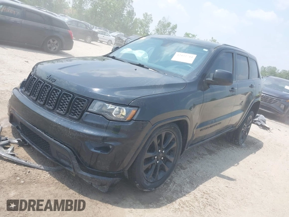 2017 Jeep Grand Cherokee Laredo with VIN 1C4RJFAGXHC818834, listed as a IAAI auction lot 42422744 with 154,287 mi miles and . Bid and sale history available at DreamBid. Image 17.