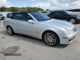 2009 Mercedes-Benz CLK-Class 3.5L with VIN WDBTK56F69T105071, listed as a Copart auction lot 77170654 with 70,688 mi miles and Salvage Title. Bid and sale history available at carsss.com. Image 4.