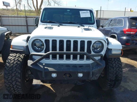 2021 Jeep Gladiator Rubicon with VIN 1C6JJTBG4ML536085, listed as a IAAI auction lot 41898204 with 39,627 mi miles and . Bid and sale history available at DreamBid. Image 12.
