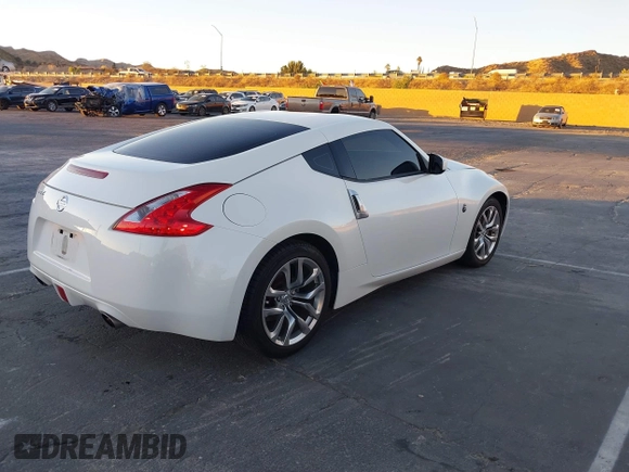 2014 Nissan 370Z Touring с VIN JN1AZ4EH2EM635420, выставлен на аукционе IAAI как лот 40862653 с пробегом 68 004 миль миль и . История ставок и продаж доступна на DreamBid. Изображение 4.