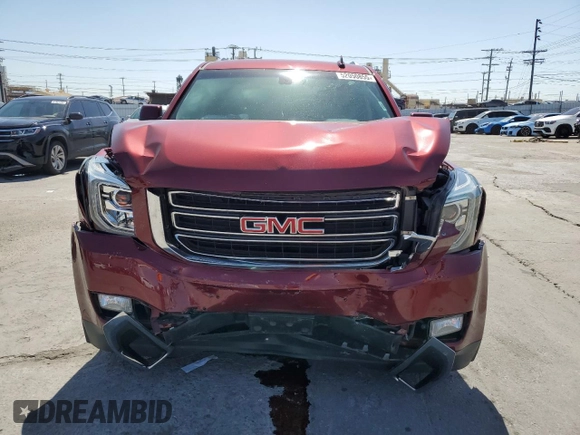 2019 GMC Yukon SLE with VIN 1GKS1AKC9KR355643, listed as a Copart auction lot 52050855 with 50,729 mi miles and Salvage Title. Bid and sale history available at carsss.com. Image 5.
