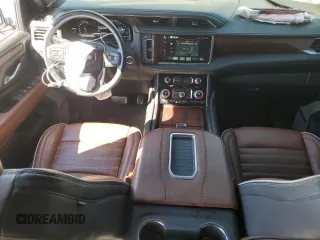2023 GMC Yukon Denali Ultimate with VIN 1GKS2EKL0PR132029, listed as a Copart auction lot 77234034 with 58,071 mi miles and Salvage Title. Bid and sale history available at carsss.com. Image 8.