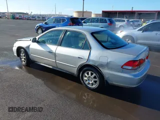 2002 Honda Accord SE with VIN 1HGCG56712A064900, listed as a IAAI auction lot 42184540 with Not provided miles and . Bid and sale history available at DreamBid. Image 3.