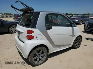 2013 Smart fortwo Pure z VIN WMEEJ3BA9DK627656, wystawiony jako Copart lot #52109195 z przebiegiem 118 181 mil mil oraz Tytuł czysty. Historia ofert i sprzedaży dostępna na DreamBid. Obrazek 3.
