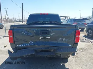 2018 Chevrolet Silverado 1500 LT with VIN 3GCUKREC1JG511846, listed as a IAAI auction lot 42024170 with 121,532 mi miles and . Bid and sale history available at DreamBid. Image 16.