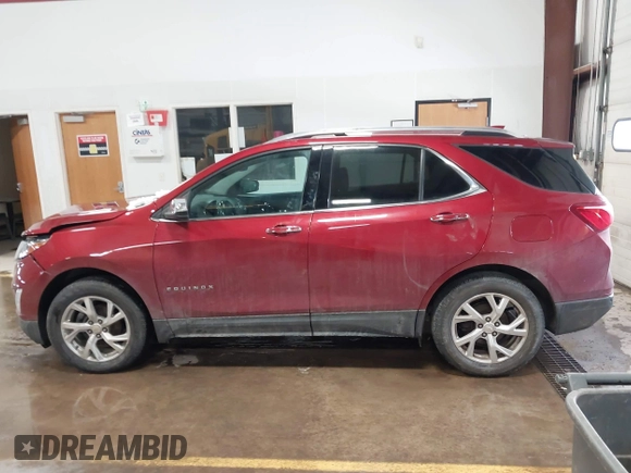 2019 Chevrolet Equinox Premier with VIN 2GNAXXEV0K6110156, listed as a IAAI auction lot 41639256 with 99,531 mi miles and . Bid and sale history available at DreamBid. Image 14.