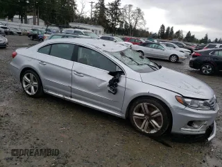 2014 Volkswagen CC Sport with VIN WVWAP7AN3EE527947, listed as a Copart auction lot 52452885 with 143,354 mi miles and Salvage Title. Bid and sale history available at carsss.com. Image 4.