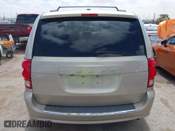 2014 Dodge Grand Caravan SXT with VIN 2C4RDGCG6ER466459, listed as a IAAI auction lot 41820907 with 105,404 mi miles and . Bid and sale history available at DreamBid. Image 15.