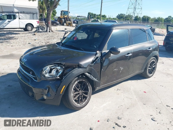 2015 MINI Countryman S with VIN WMWZC3C58FWT04316, listed as a IAAI auction lot 42525698 with 97,046 mi miles and . Bid and sale history available at DreamBid. Image 17.