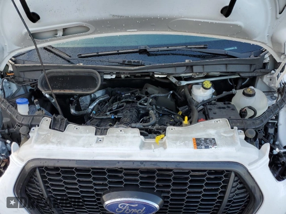 2021 Ford Transit Cargo with VIN 1FTBR1CG7MKA88875, listed as a Copart auction lot 84705324 with 23,654 mi miles and Salvage Title. Bid and sale history available at DreamBid. Image 12.