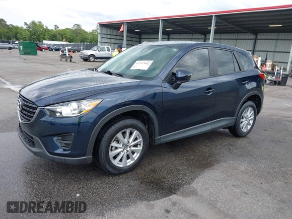2016 Mazda CX-5 Sport with VIN JM3KE2BY0G0850298, listed as a IAAI auction lot 42107007 with 97,478 mi miles. Bid and sale history available at carsss.com. Image 17.