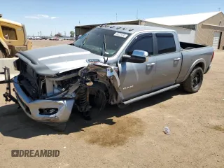 2021 Ram 2500 Laramie with VIN 3C6UR5FL8MG591094, listed as a Copart auction lot 60221635 with 124,513 mi miles and Salvage title. Bid and sale history available at DreamBid. Image 1.