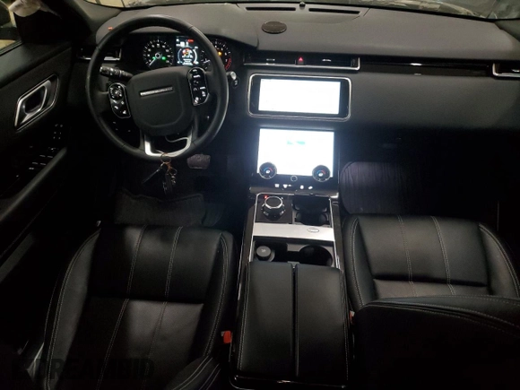 2020 Land Rover Range Rover Velar S z VIN SALYB2EX3LA287145, wystawiony jako Copart lot #56004615 z przebiegiem 47 482 mil mil oraz Szkoda całkowita • Salvage title. Historia ofert i sprzedaży dostępna na DreamBid. Obrazek 8.