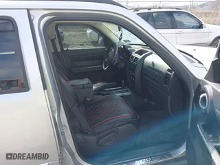 2011 Dodge Nitro Heat with VIN 1D4PU4GKXBW598683, listed as a IAAI auction lot 41958182 with 167,114 mi miles. Bid and sale history available at carsss.com. Image 5.